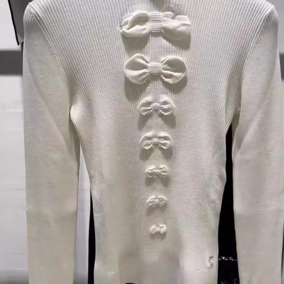 

Autumn and winter new hem decoration versatile slim fit bow top