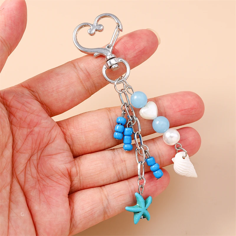 Niedliche handgefertigte Perlen-Schlüsselanhänger, Sommer-Strand-Sternfisch-Muschel-Anhänger, Schlüsselringe für Damen und Herren, Autoschlüssel, Handtaschen-Schlüsselanhänger, DIY-Geschenke – Detail 5