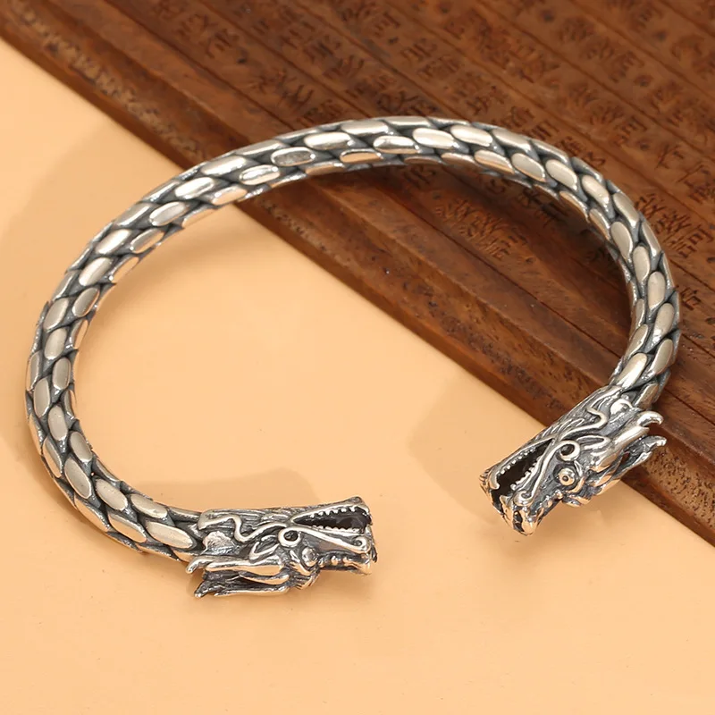 

Retro national trend domineering personalized double Chinese dragon heads woven men's S925 sterling silver Thai silver bracelet