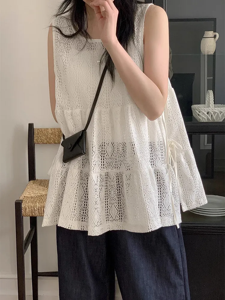 

Clothland Women Sweet Hollow Out Blouse Lace Up Sleeveless Transparent Shirt White Summer Cute Tops Mujer WA444