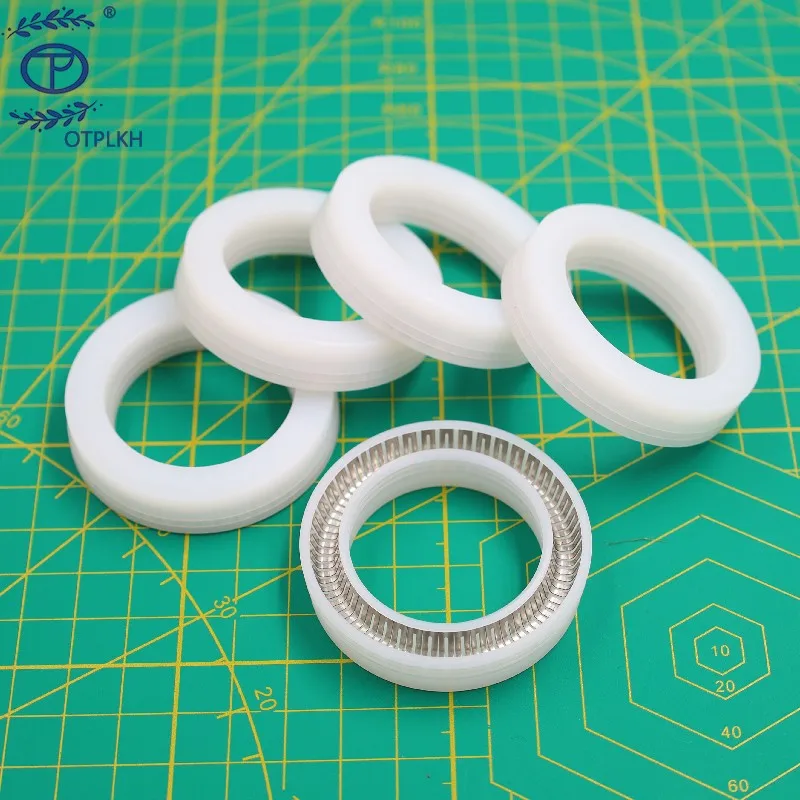 Spring seal ring for shaft Three-lip white ultra-high molecular weight polyethylene with V spring UPE seal OTPLKH customized