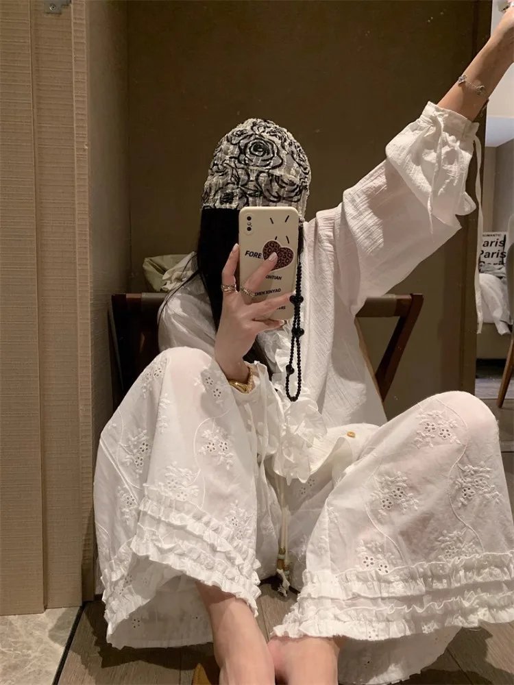 Białe koronkowe spodnie z szerokimi nogawkami, elastyczną talią, luźne, codzienne, o prostym kroju, letnie, nowe, wyszczuplające, damskie, modne.