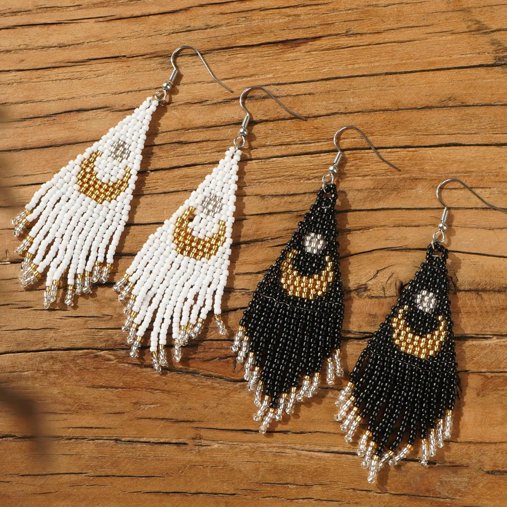

Rice bead earrings Tassels Inverted moon Creativity Bohemia Pattern Geometry Hand weaving Alloy Female Fashion Beaded earrings
