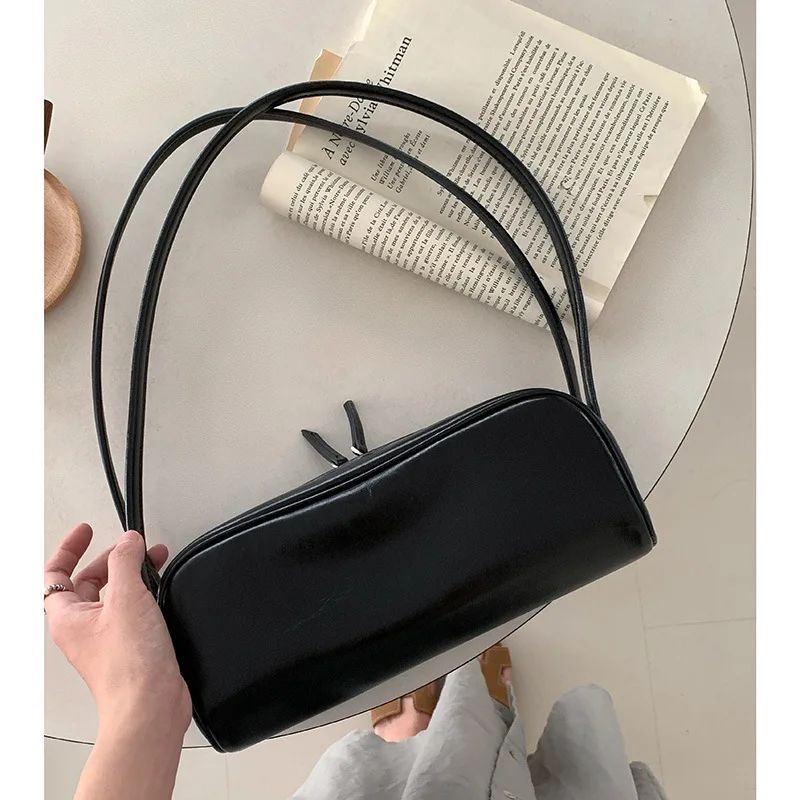 Echt lederen onderarmtas 2025, nieuwe niche-ontwerp, oliewas, koeienhuid, vintage handtas, mode, high-end damesschoudertas