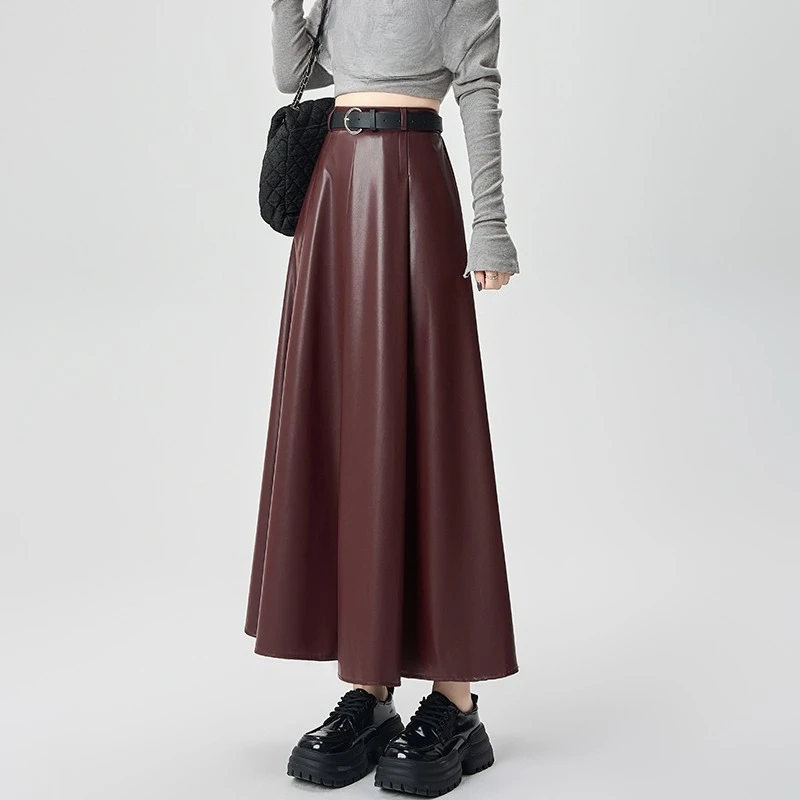 Séoulish automne hiver PU cuir femmes parapluie jupes longues avec ceinture 2025 nouveau Vintage taille haute ample a-ligne jupe femme
