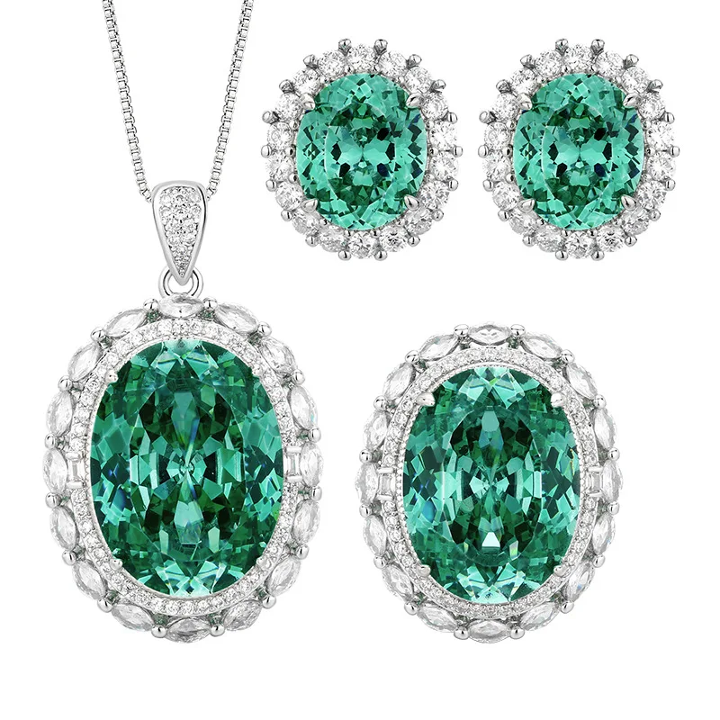 

Green Gem Charm Copper Gold Plated Jewelry Three Piece Set Available with Necklace, Ring, and Earrings