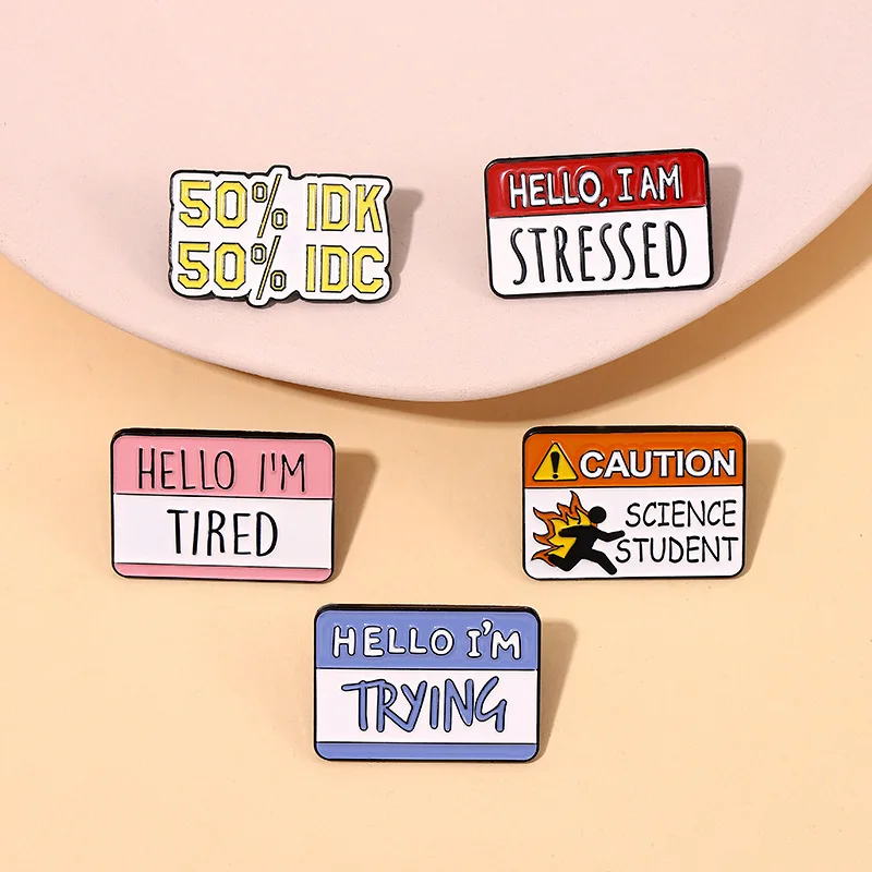 hello I am trying attention cation slogon metal design Badges Brooch Enamel Pins label Bag Backpack Jewelry gift