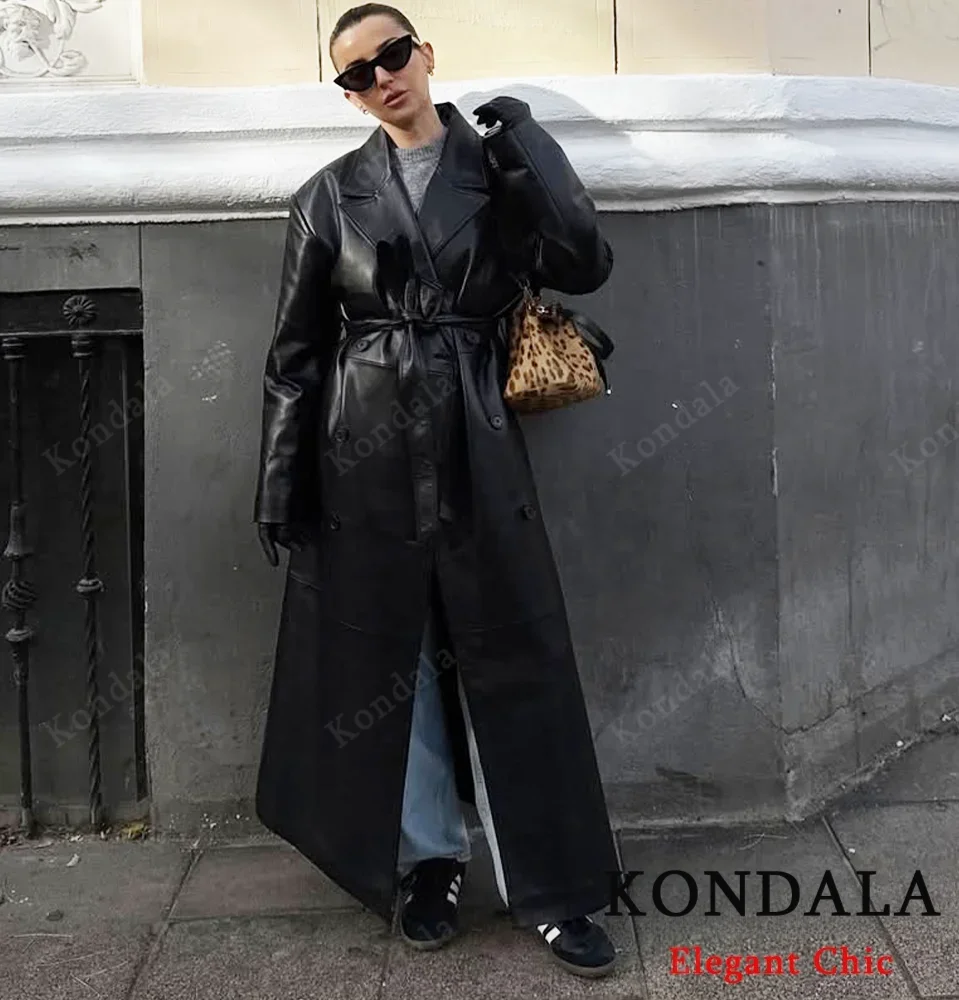 

KONDALA женский модный длинный плащ из искусственной кожи с лацканами, классическое однотонное длинное пальто с поясом, новинка 2024, осеннее кожаное пальто High Street