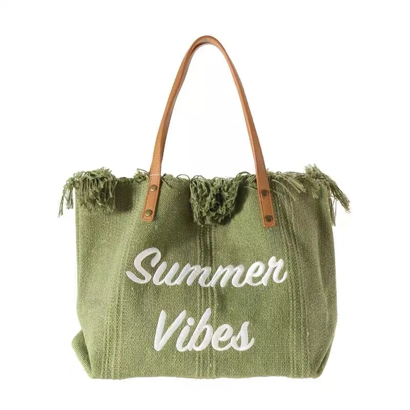 Bolso de mano con borlas y letras bordadas para mujer, bandolera de gran capacidad con diseño sencillo de nicho, ideal para viaje y playa, a la