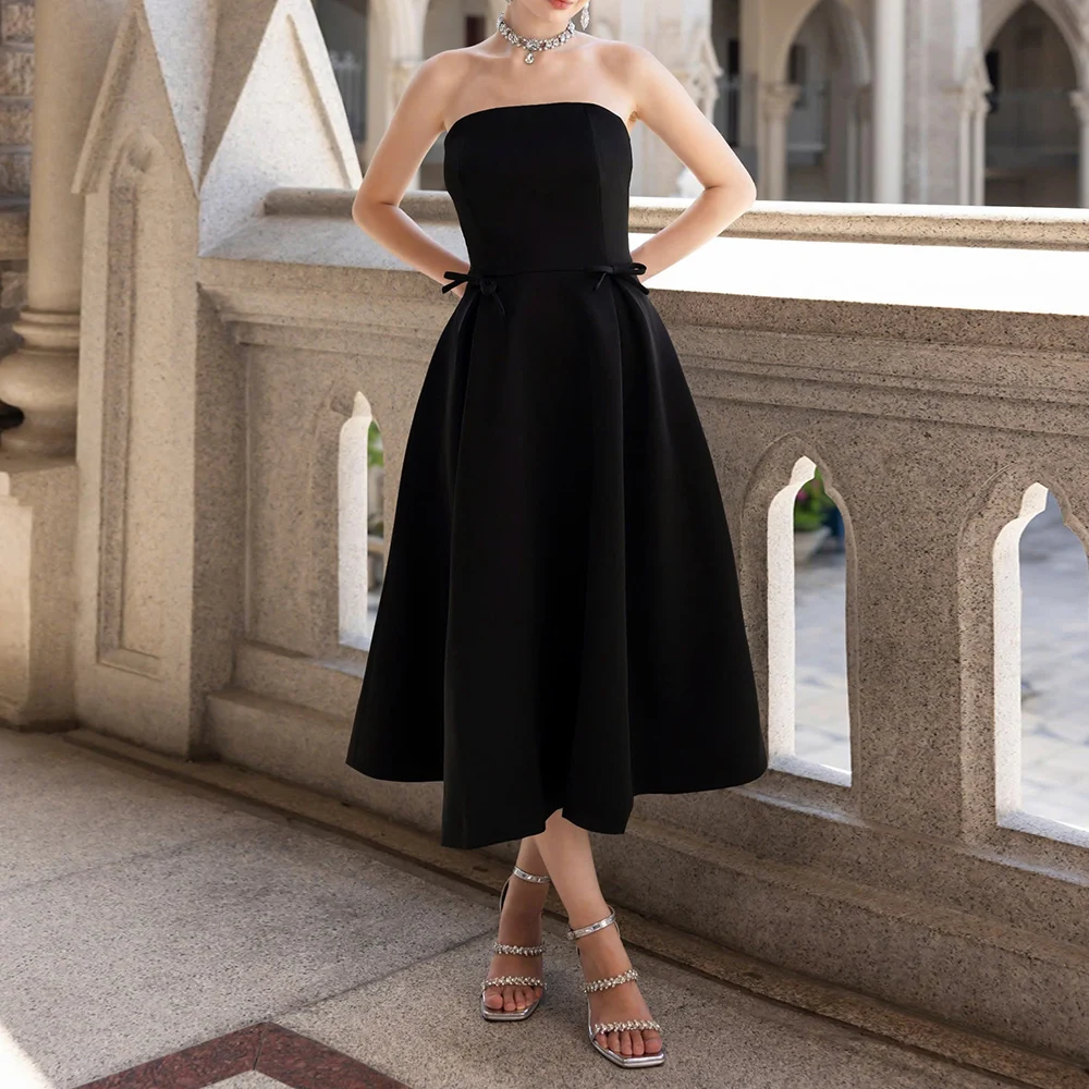 

Simple Party Dress Black A Line Strapless Bows Tea Length Women's Party Gowns Midi Sleeveless Backless Elegant Homecoming Dress