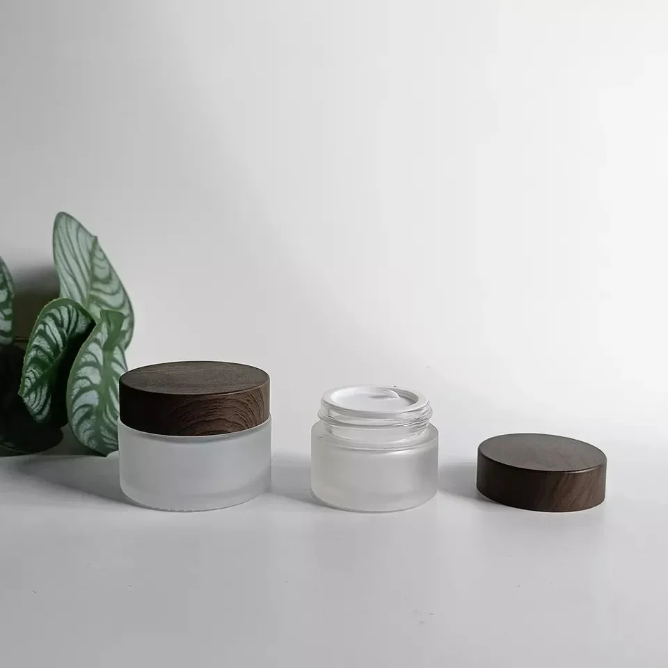 قناع كريم الوجه التجميلي، حاوية مستحضرات التجميل، برطمانات كريم بلوري، لوشن الجسم الزجاجي الشفاف غير اللامع مع أغطية خشبية داكنة بلاستيكية #4