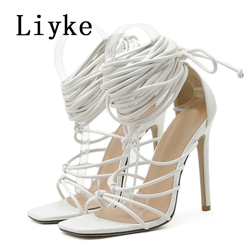 

Liyke New Fashion Lace Up Women Sandals Summer Sexy Narrow Band Square Toe Thin High Heels Cross Strap Party Shoes Ladies Pumps