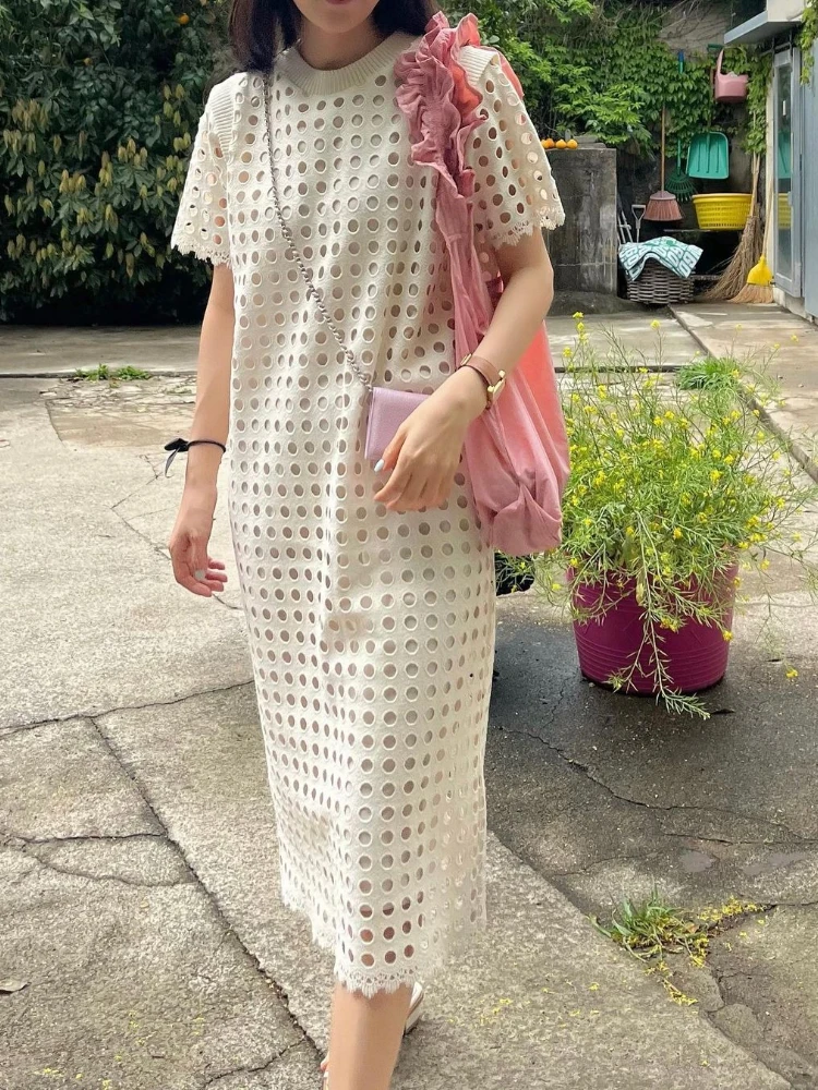 Elegantes Sommerkleid mit Rundhalsausschnitt und ausgehöhltem Design, Nische, lockeres, durchsichtiges, kurzärmliges Kleid für Damen, französische Urlaubs-Robe