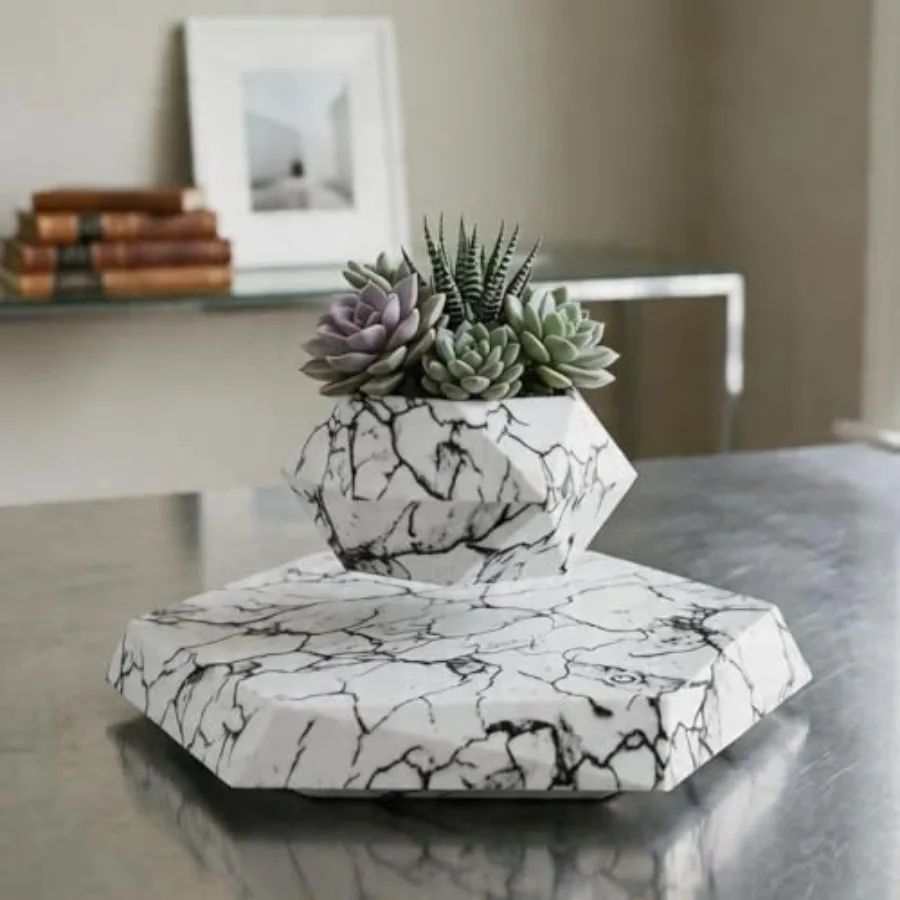 

Marble Nursery Pot for indoor succulent decor: white marble, 360 sunlight exposure, lightweight yet sturdy, elegant floating pl