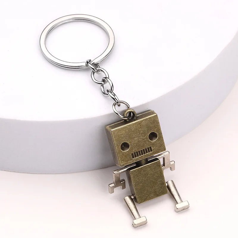 Creatieve beweegbare robot sleutelhanger Retro eenvoudige schattige cartoon hanger sleutelhanger ketting 1/3pc