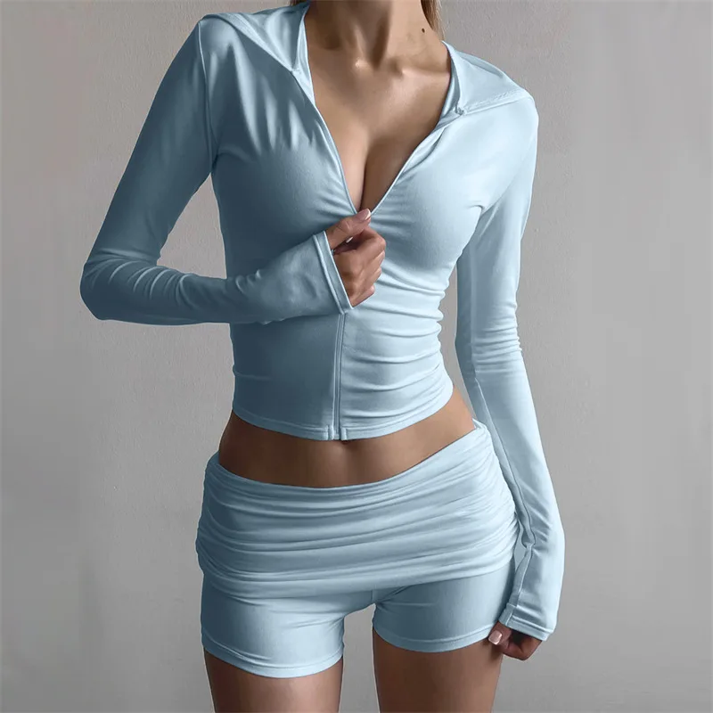 Europäischer und amerikanischer Stil Damen Herbst neuer Reißverschluss Kapuzenoberteil plissierte enge Shorts Mode Sportstil zweiteiliger Anzug