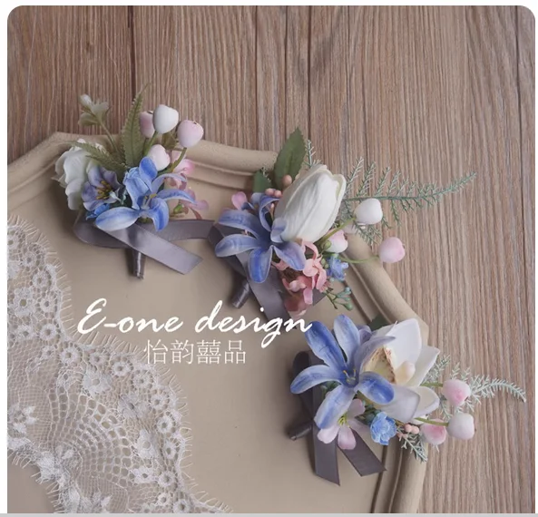 European pink and blue wedding corsage wrist flower bride groom bridesmaid groomsman parents