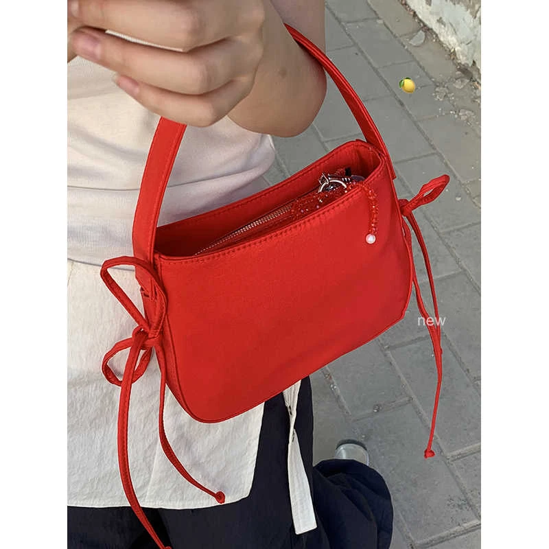

Fashion Nylon Cloth Women's Handbags New Chic Bow Lace-up Versatile Temperament Underarm Bags Fashion Niche One Shoulder Bags