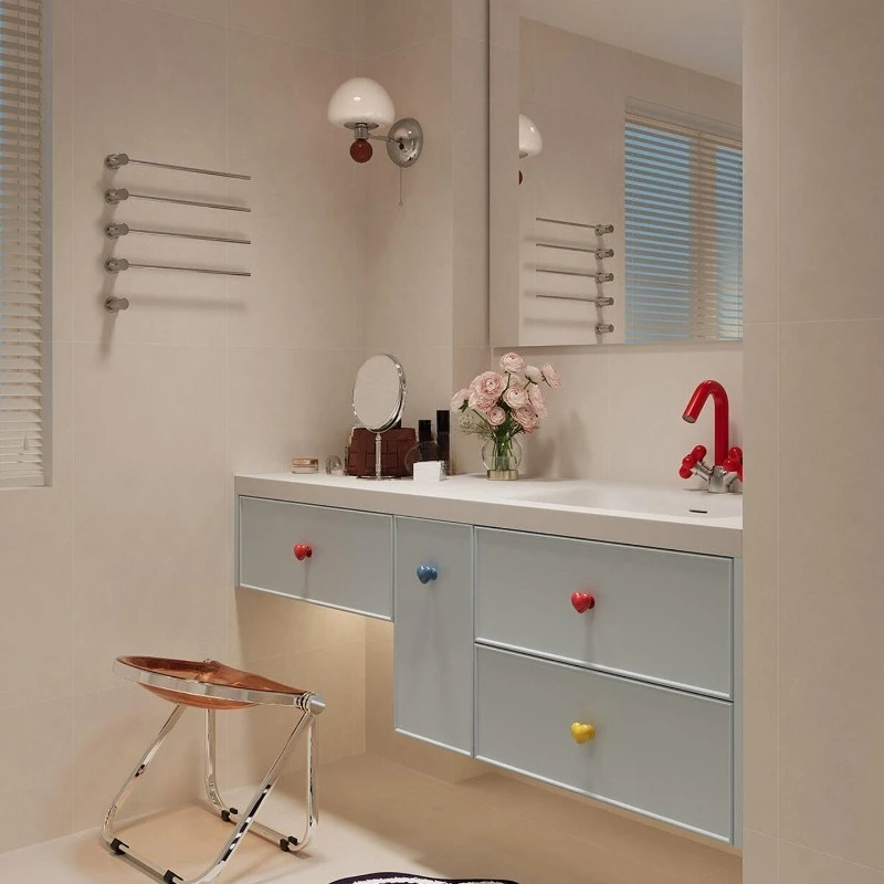 Dresser, bathroom cabinet, combination toilet, hand and face basin.