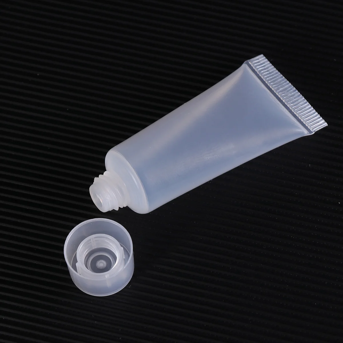 

40 Pcs Refillable Travel Bottles 10ml Squeezable Containers for Shower Gel Shampoo Lotions Portable Reusable Storage Tubes