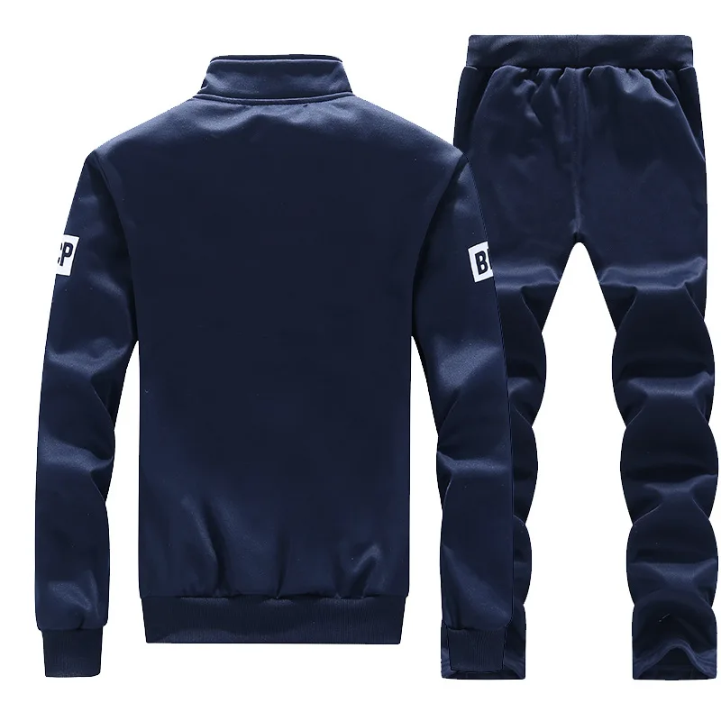 Nuevos trajes de chándal para hombre, traje de camión para primavera y otoño, conjunto de ropa deportiva con estampado de letras y cuello levantado,