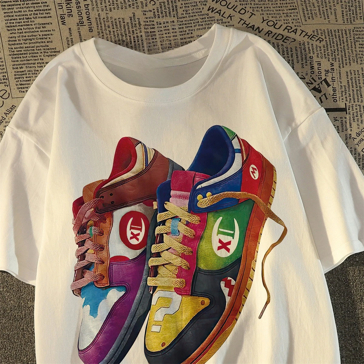 2025 moda de verano transpirable versión de nicho zapato impreso Top hombres y mujeres misma camisa de fondo Camiseta de algodón suelta