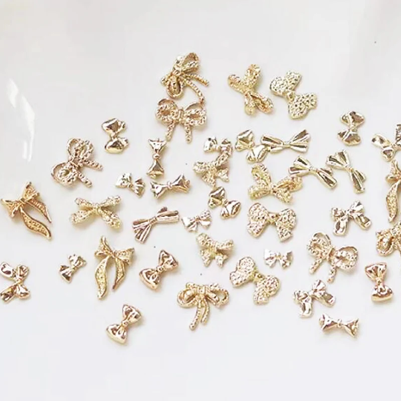 50pcs/bag Luxury Alloy Bowknot Nail Jewelry 3D Butterfly Nail Metal Nail Art Rhinestones Charms Shiny Bowtie Mixed Nail Parts