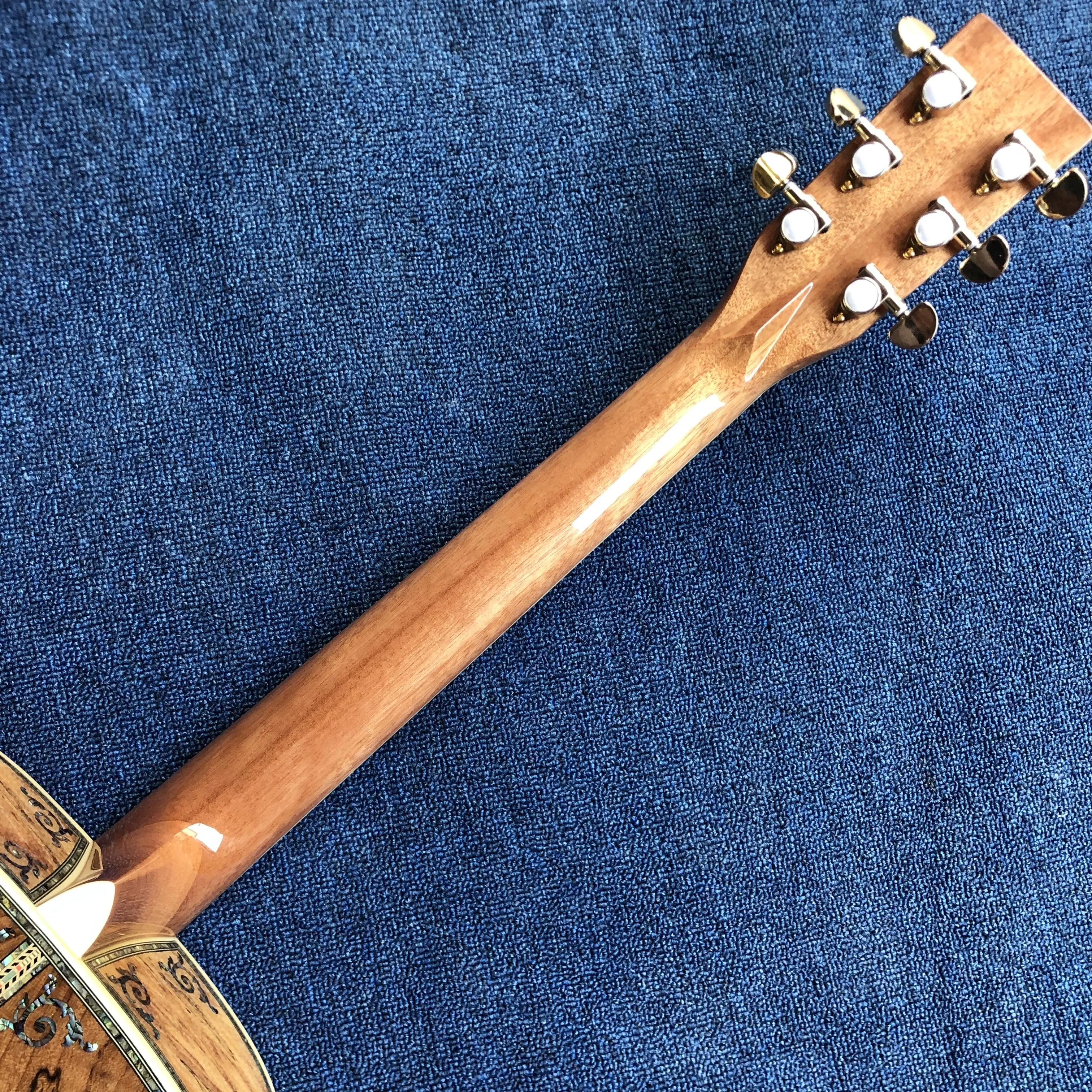 41-inch luxury acoustic guitar. Geotext top, sides and back, ebony fretboard abalone shell binding 2026-2