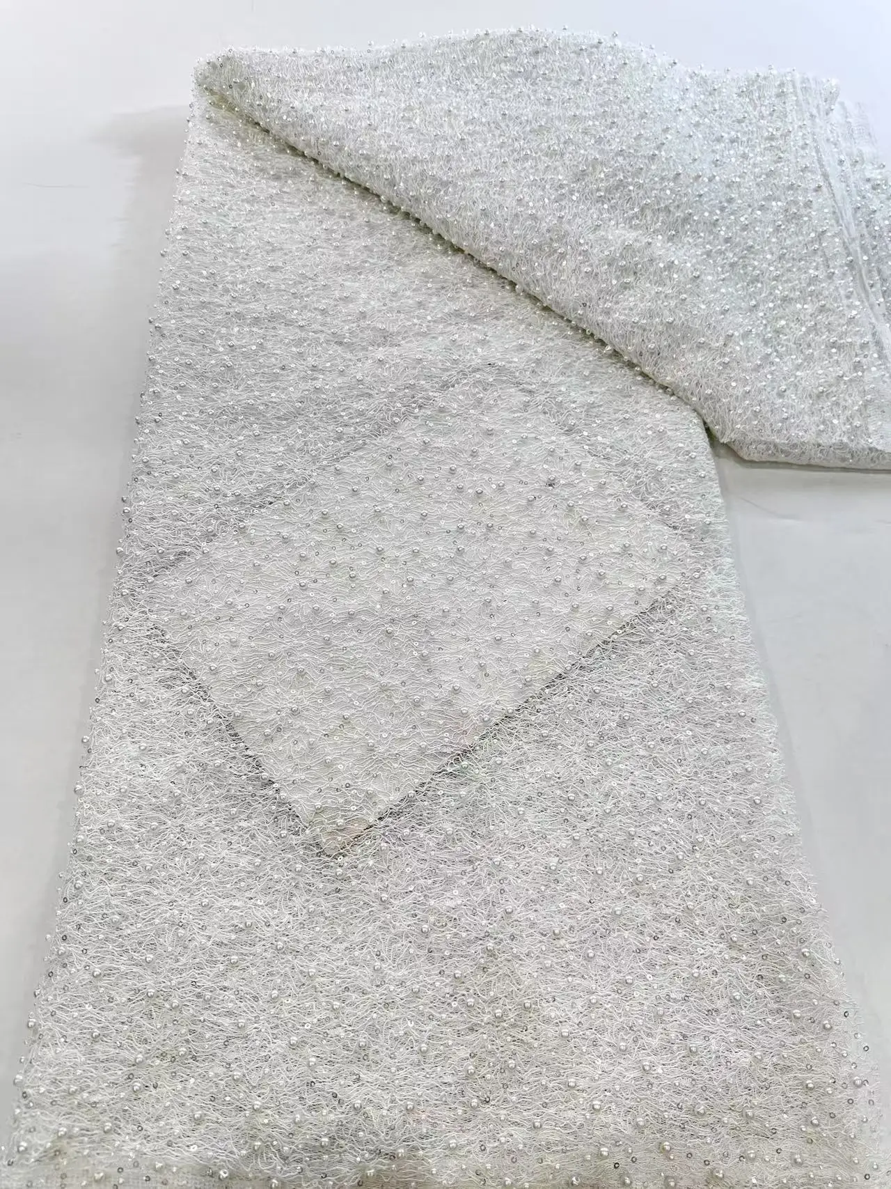 

2025 High Quality Africa Embroidered Lace Fabrics Beads Pearl French Mesh Net Fabric Sequins Tulle Lace For Wedding Dress