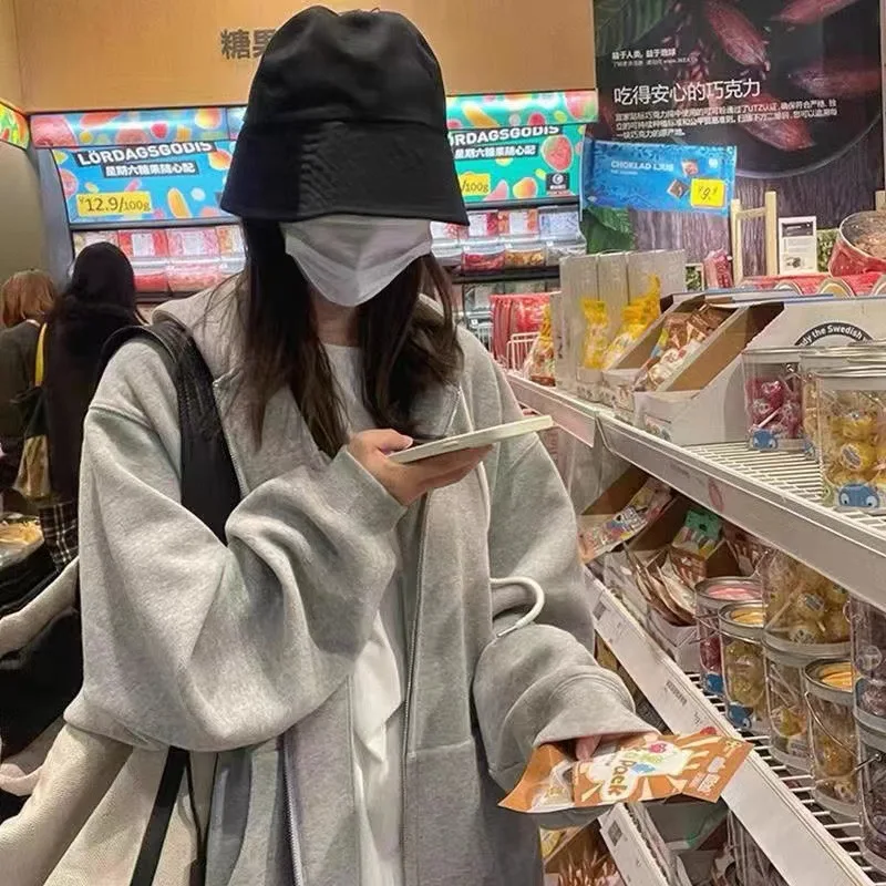 حجم كبير فضفاض سستة هوديس أسود بلون مقنعين بلوزات الموضة الكورية كم طويل جيوب الرباط CYXX086