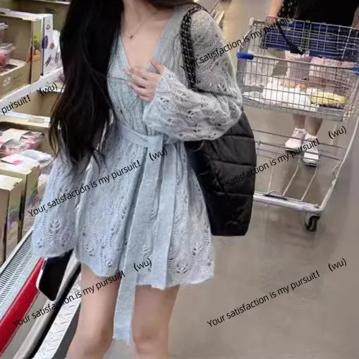 Kardigan rajutan wanita model longgar bergaya retro Jepang dengan detail lubang-lubang dan tali di pinggang