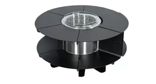 Home courtyard fire pit tea-brewing table for roasting marshmallows and roasting marshmallows over a charcoal fire for camping