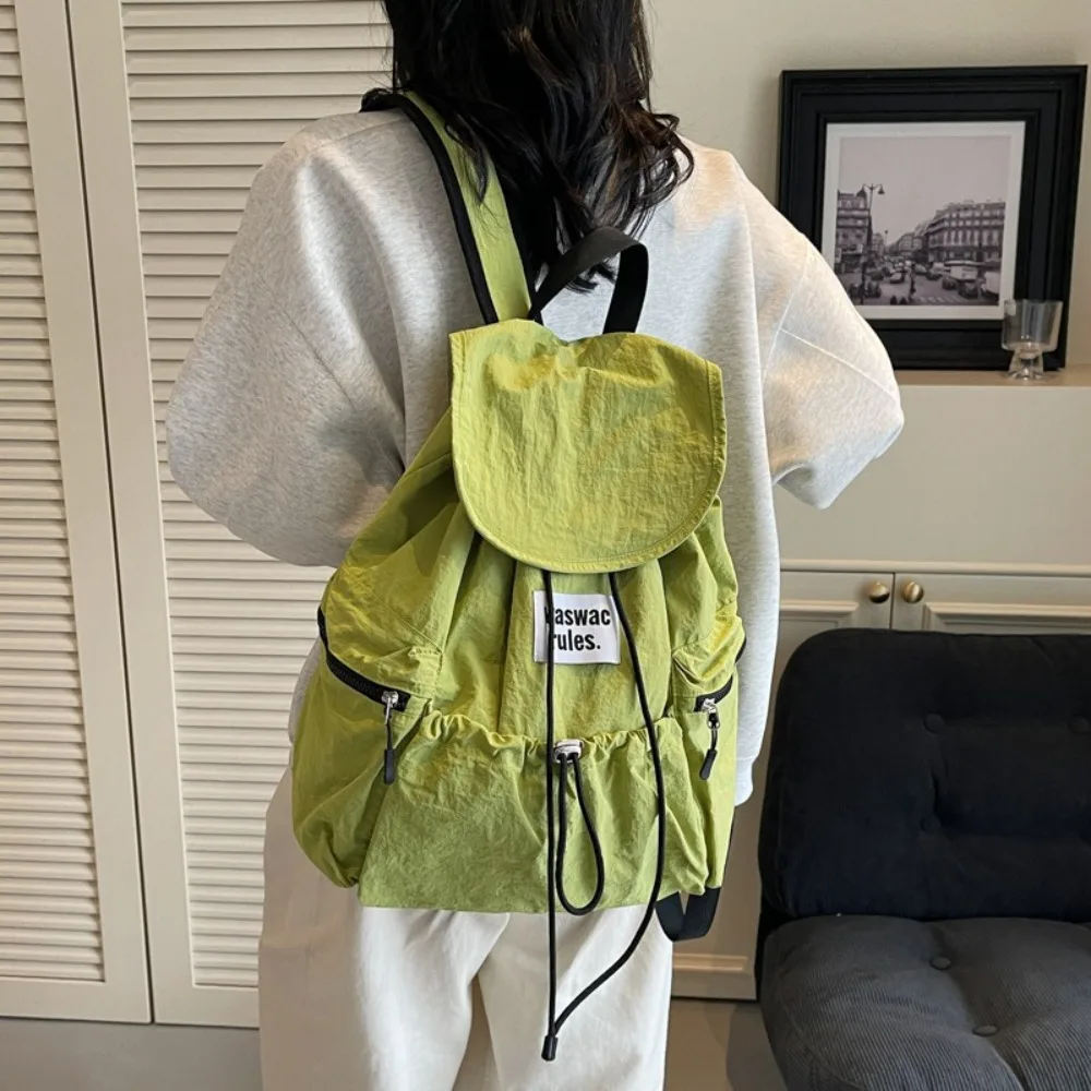 

Сплошные цветные рюкзаки на шнурке, нейлоновые легкие сумки на плечо с рюшами, повседневные студенческие школьные сумки большой вместимости для мужчин и женщин