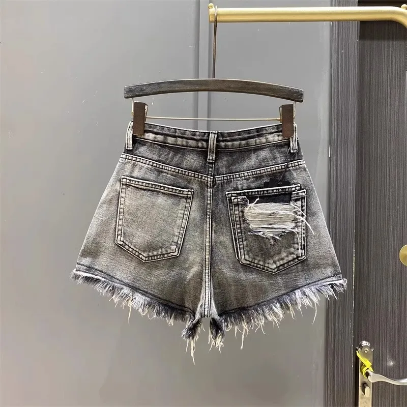 Worn Legs with Rough Edges Washed Black Denim Shorts 2026 Summer New Women Fashion A-line Wide Leg Hole Ripped Denim Shorts