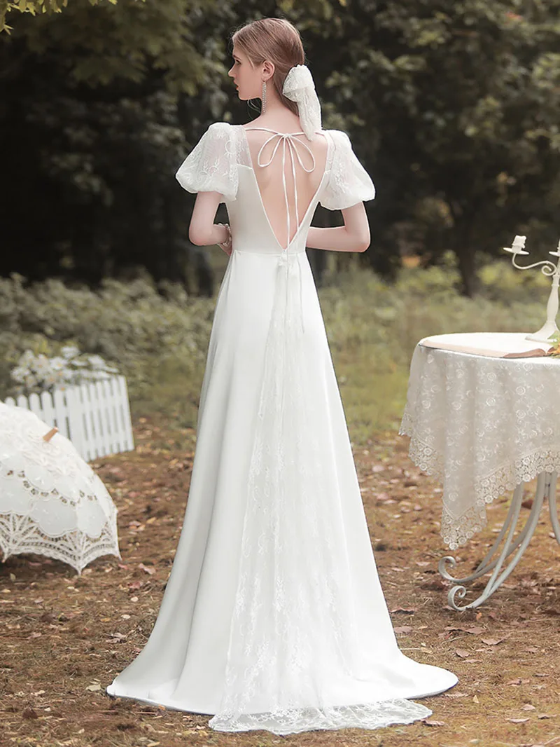 Bellissimi abiti da sposa affascinanti che dimagriscono semplici abiti da sposa Sexy aperti sul retro in pizzo elegante abito da sera