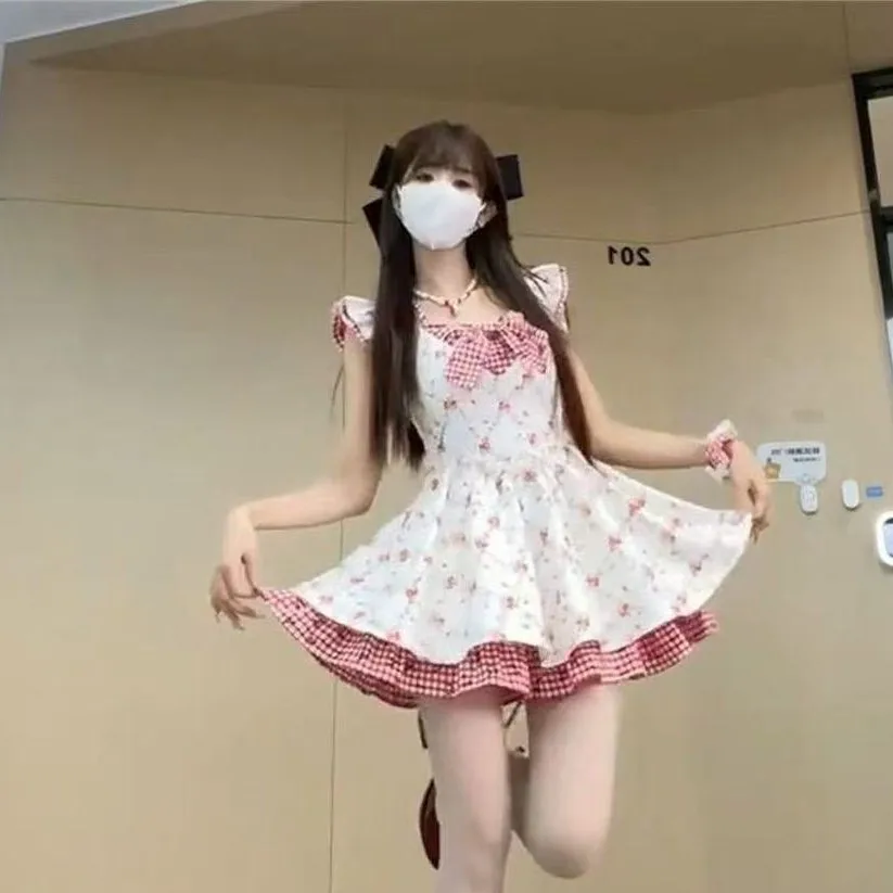 ชุดเดรสผู้หญิงแบบไม่มีแขน แต่งลายปักฉลุ ลูกไม้ผูกเชือก ผ้าแจ็คการ์ด แต่งตาไก่ จับจีบมือ แต่งสม็อค หลายชั้น สไตล์ OL