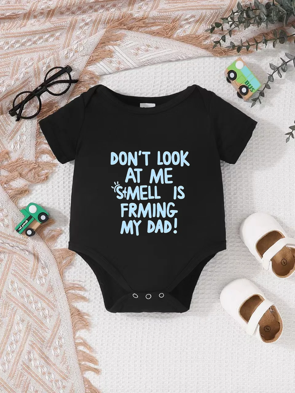 

Playful letter-printed baby short-sleeve triangle bodysuit. Button closure for easy dressing