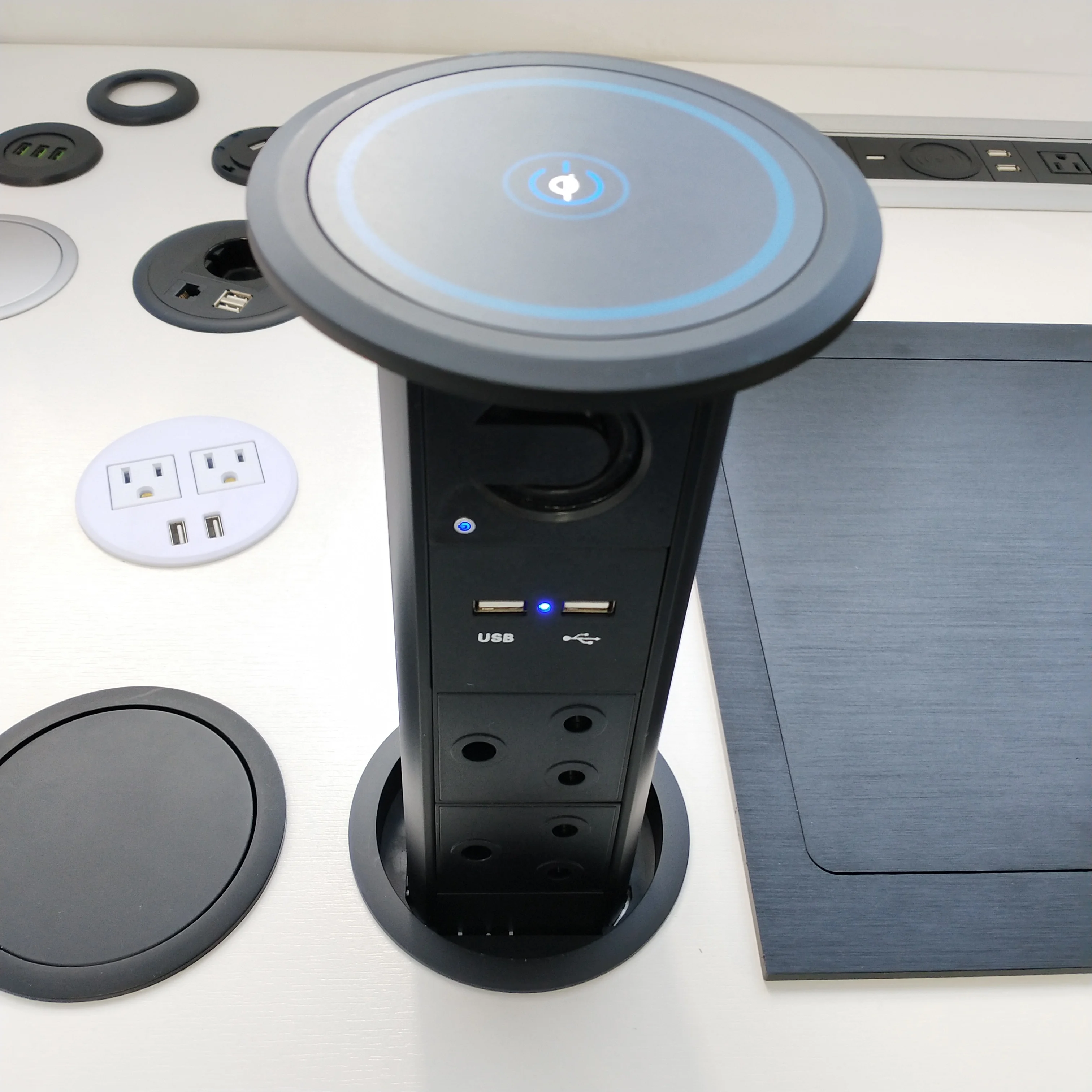 South Africa power intelligent motorized electric kitchen office tabletop pop up socket with speaker Qi wireless charger