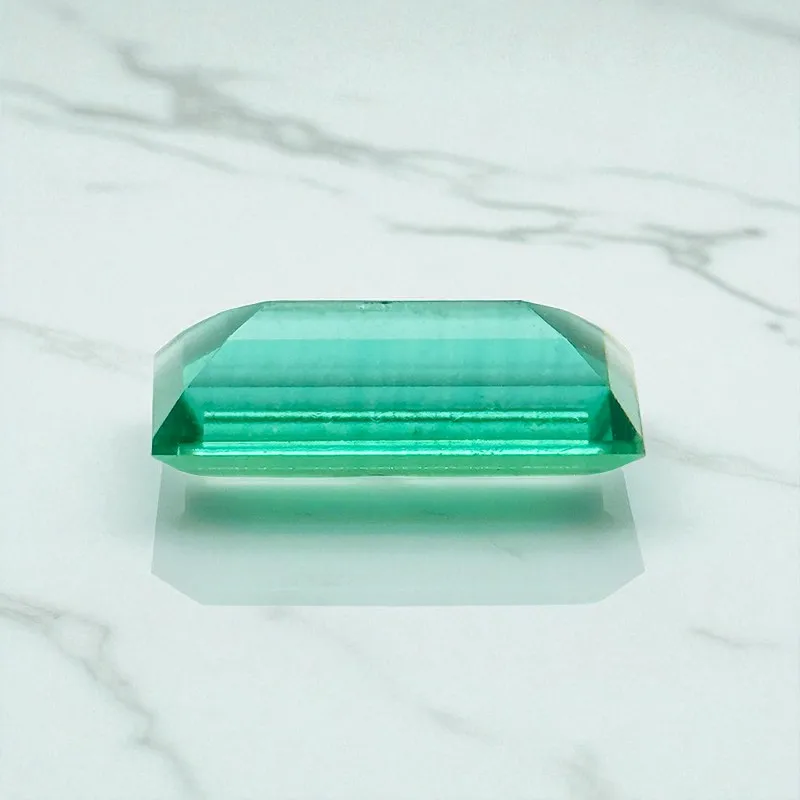 

Lab Grown Zambian Emerald- Hydrothermal, Hand-Cut, Rectangle Shape, with Cracks Inclusions, With AGL Certificate For Jewelry