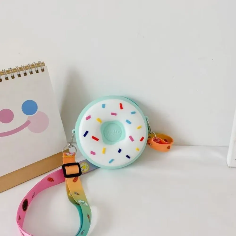 

Mini Size Donut Crossbody Bag Adjustable Strap Silicone Material Mini Snack Bag Rainbow Design Zipper Closure