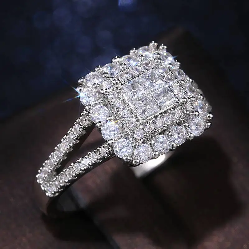 Huitan Luxus-Ring für Damen, geometrisch, mit hellen Zirkonia-Steinen besetzt, modisch, für Hochzeit, Party, Accessoires, vielseitiger, schicker Schmuck