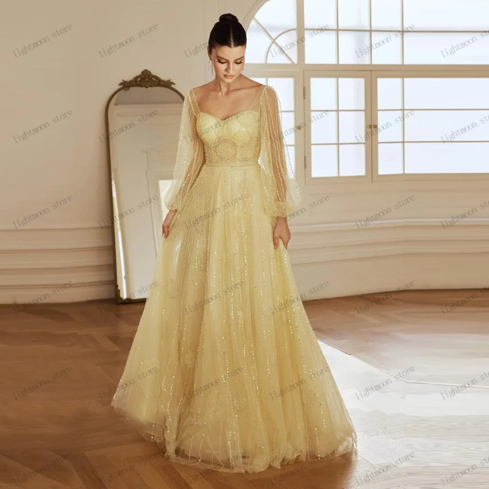 ชุดราตรีหรูหรา ชุดงานพรอมสวยงาม ประดับด้วยลูกปัดและงานปักแขนยาวทรงเอไลน์ ชุดราตรีทรงสวยสง่า สามารถสั่งตัดได้ ปี 2026