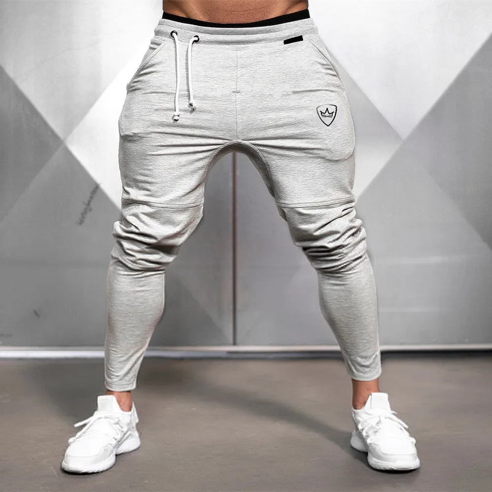 Pantalon de survêtement en coton uni pour homme, vêtement de Sport décontracté, de jogging, de Fitness, d'entraînement, de printemps et d'automne