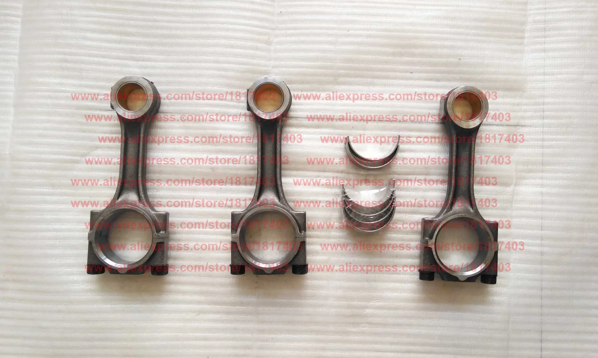 

Jiangdong TY295.4.1.2-1 Connecting Rod + TY295.4.1-6 Connecting Rod Bearing Shell, Jiangdong JD TY395IT / TY3100IT Engine Parts