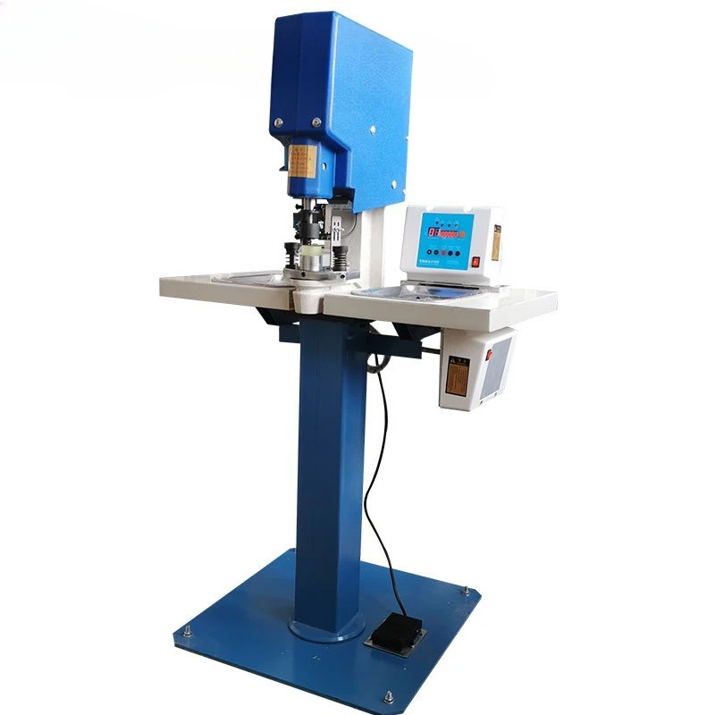 

Electric bag button machin e Auto matic clo thing b ag button cloth ba g button machine