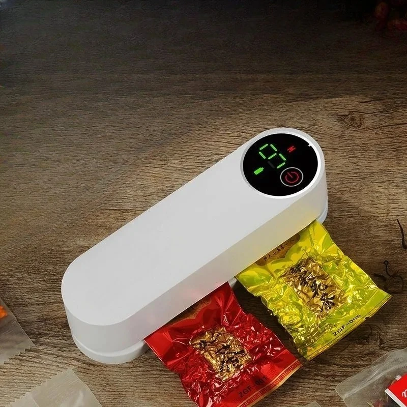 

Mini hand pressure charging and sealing machine, small household plastic sealing artifact