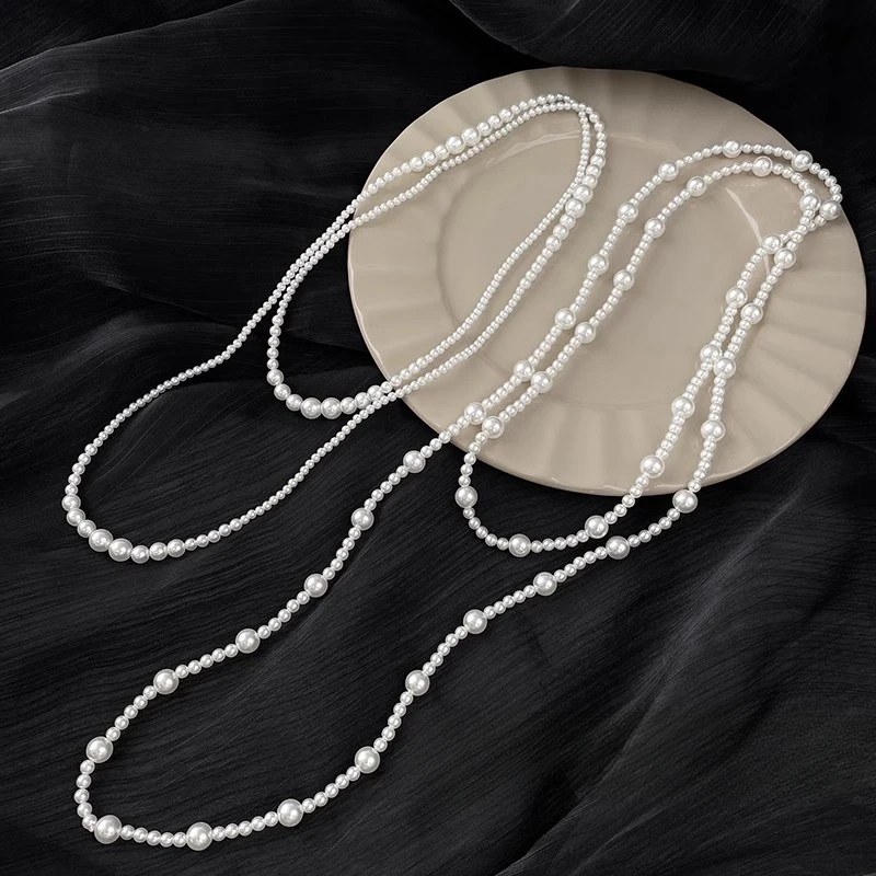 Long stacked pearl necklace women's light luxury temperament collarbone chain design sweater neck chain