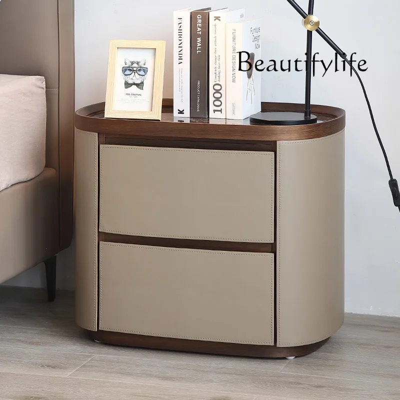 

Italian minimalist rock slab saddle leather bedside table modern oval sofa bedroom storage bedside table