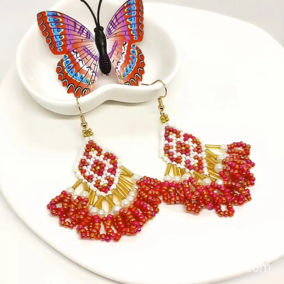 

Rice bead earrings Geometry Design Tassel Originality Hand knitting Bohemia Alloy Fashion Simple Female Beaded earrings