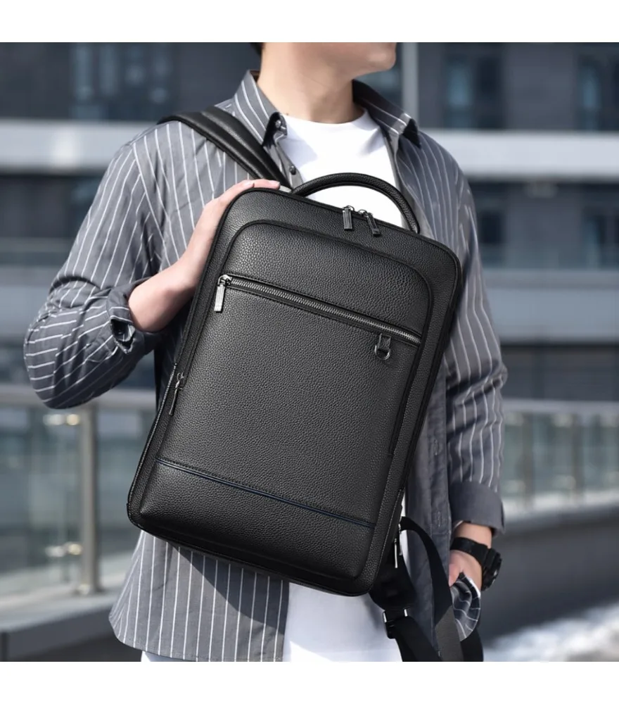 Black lychee grain leather expandable backpack multi layered zipper pockets anti splash side built in USB for office storage
